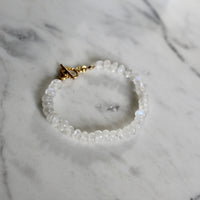 7.25" Rainbow Moonstone Silk Knotted Bracelet with Vintage Rope Toggle Clasp